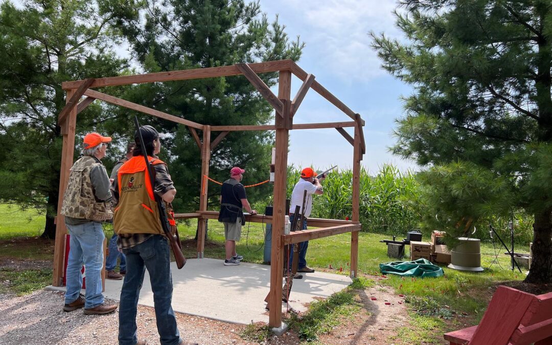 Several people participating in a clay shoot event for Leukemia & Lymphoma Society