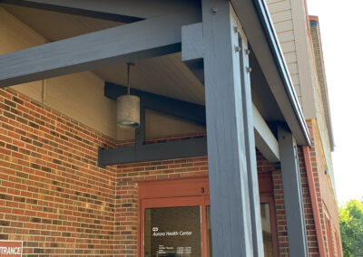 Exterior canopy outside a door at the Aurora West Bend facility