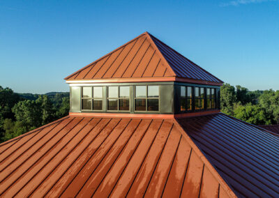 Picture of orangish siding/roofing for Aurora West Bend