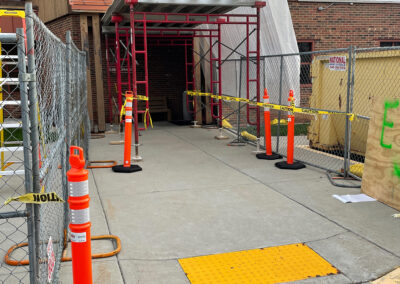 Fenced off exterior construction of the Aurora West Bend facility