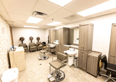 Salon space at Avalon Square featuring stylist chairs