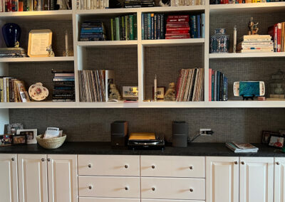 Large wall of built-in shelving from Eastcastle Place senior living facility