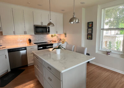 Kitchen space featuring an island from Eastcastle Place senior living facility