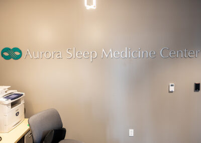 Aurora Sleep Medicine Center wall sign from a straight on viewing