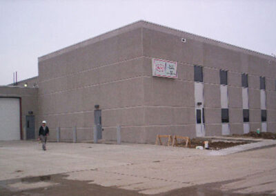 Exterior of the Henkel Surface Technologies office and laboratory building featuring a Beeler employee
