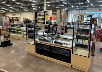 Interior retail display featuring men's cologne products at Macy's Highland Grove