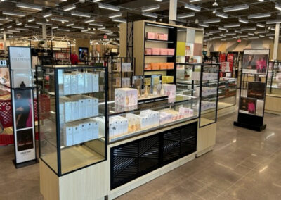 Interior retail display featuring perfume products at Macy's Highland Grove