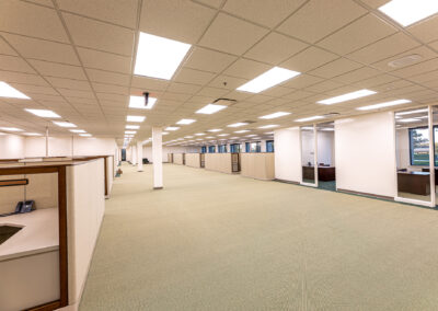 Interior walking path alongside cubicles at Uline