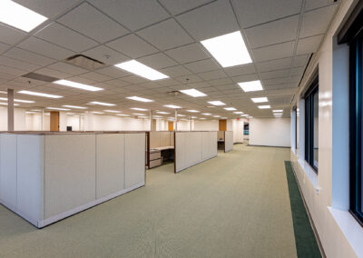 Interior walking path alongside cubicles at Uline