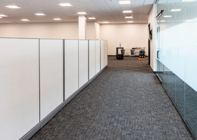 Hallway along a cubicle wall at Westbrook MTE Tenant Buildout