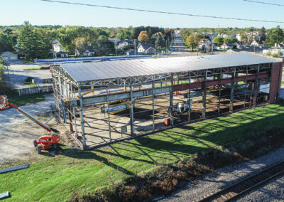 Side view of VisuSewer’s pre-engineered metal building